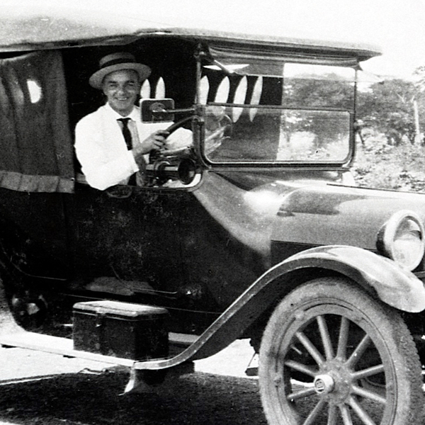Our Story vintage portrait 4 of Master Distiller Peter Westfall in a car